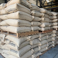 Sacks of coffee in warehouse