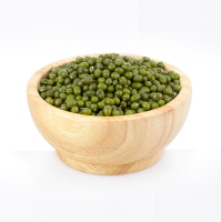 Green mung beans in a wood bowl, cenital picture