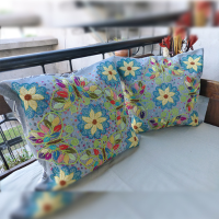 Butterflies in red field cushion