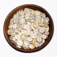 Close-up frontal shot of Cuzco Corn s in a wooden bowl.