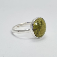 Silver ring with serpentine stone
