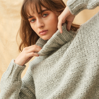Beautiful turtle neck sweater by Fringe by Knit Couture