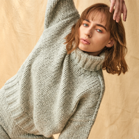 Beautiful turtle neck sweater by Fringe by Knit Couture