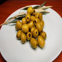 Pitted green olives