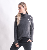 Sweater with details made with the intarsia technique on the back and front