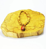 PALO SANTO BRACELET WITH HUAYRURO CHARM